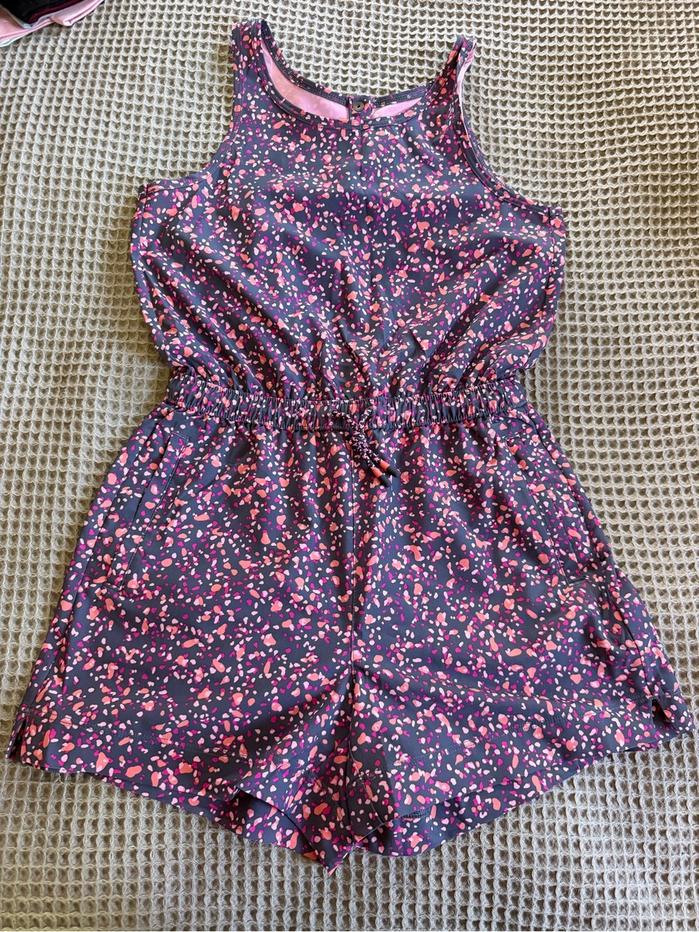 Athleta Girl Sleeveless Navy Romper with Pink Heart Print